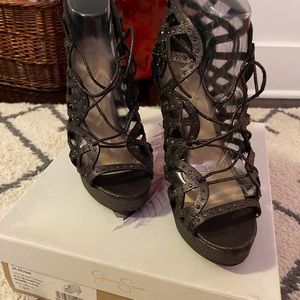 Beau pair of purple metallic tie up stiletto shoes in excellent condition